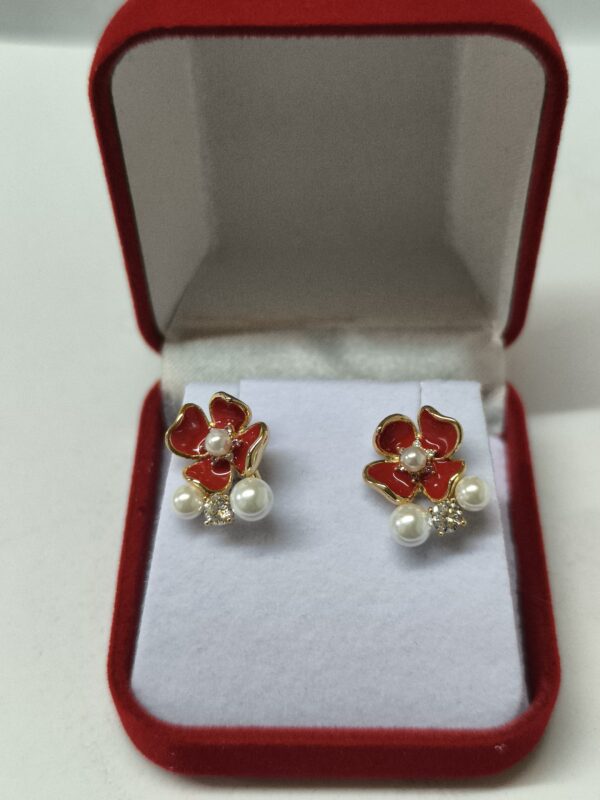 IMG_20260610_191830 Aros flor y perlas