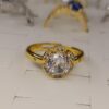 anillo flor dorado