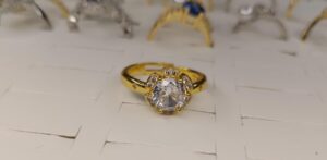 anillo flor dorado