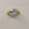 anillo flor dorado