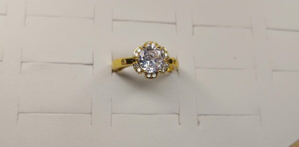 anillo flor dorado