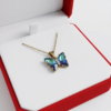 Collar mariposa azul tornasolado