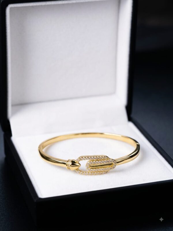 Pulsera rígida dorada