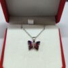 Collar mariposa fucsia tornasol 🩷