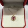 Collar corazón rosa tornasol 🩷
